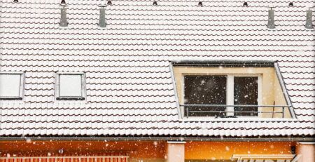 Image of rooftop patio during snowfall