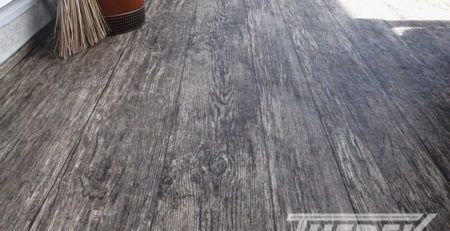 Rustic vinyl plank flooring installed by Tufdek