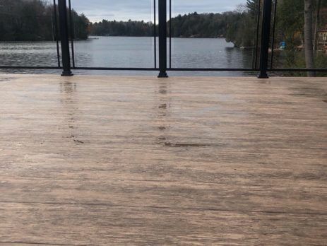 Vinyl wood plank flooring on a lakeside deck