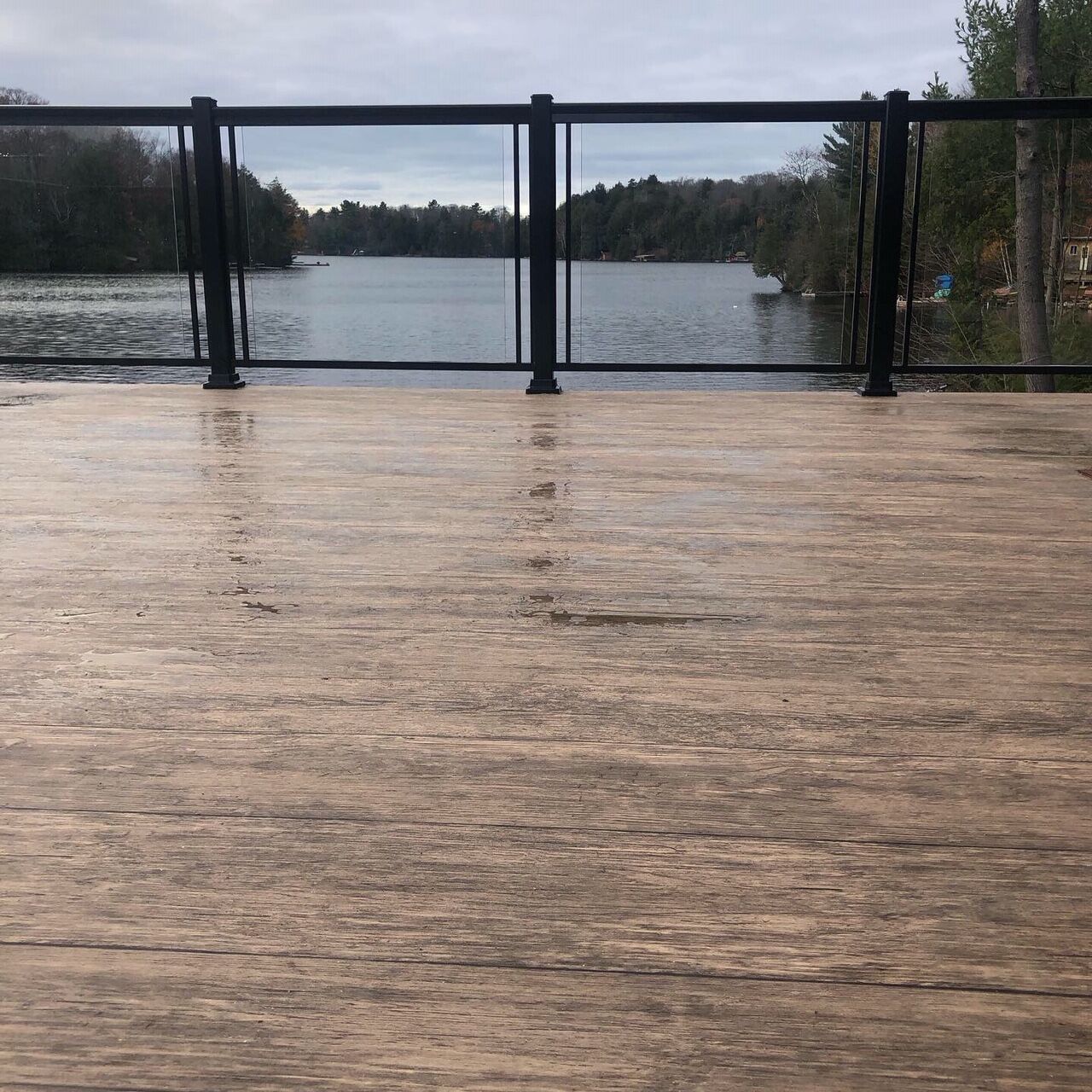 Vinyl wood plank flooring on a lakeside deck