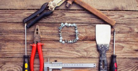 Tools arranged in the shape of a home