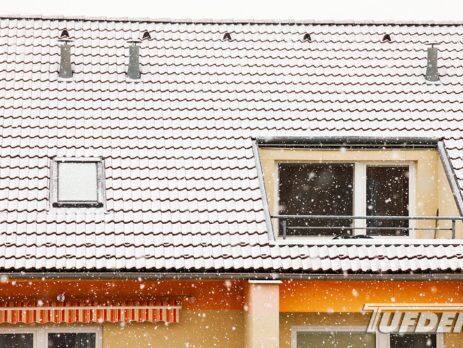 Image of rooftop patio during snowfall