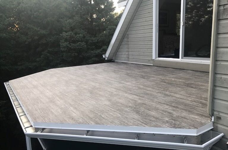 Flat vinyl roof deck installation