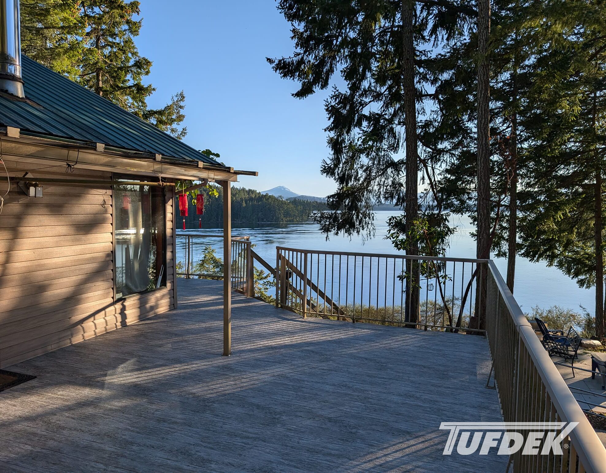 Tufdek Designer Series Vinyl Decking Installation Lakeside cabin with waterproof decking