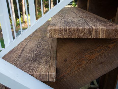 Exterior deck stairs covered in waterproof wood plank vinyl flooring