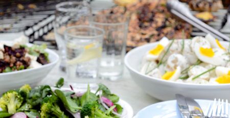 Plates of food on an outdoor table