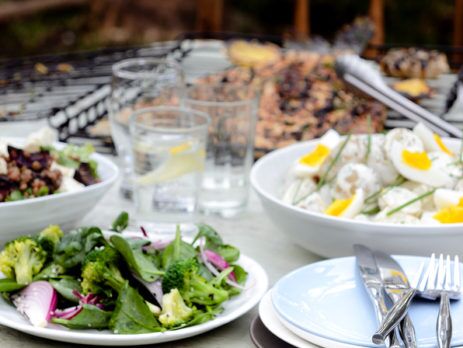 Plates of food on an outdoor table