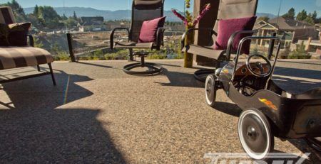 Deck furniture and peddle car on PVC vinyl covered deck