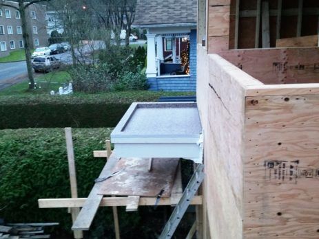 Home under construction with waterproof vinyl flooring on balcony