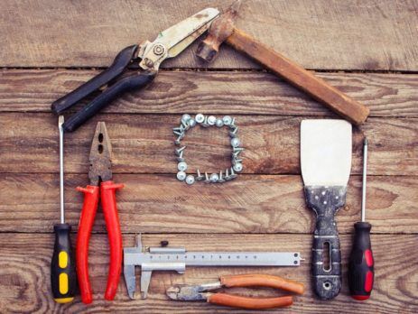 Tools arranged in the shape of a home