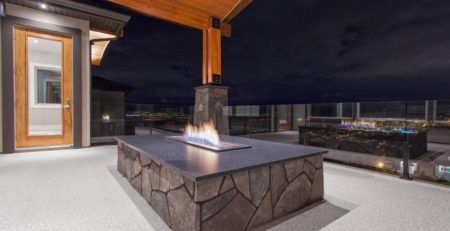 Deck fire pit on a deck newly covered with waterproof vinyl decking by Tufdek