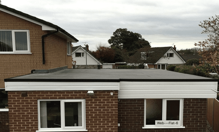 Flat roof deck newly resurfaced with waterproof vinyl decking