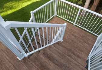 Deck stairs and landing finished with waterproof birch plank vinyl decking.